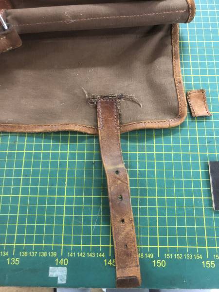 Fixation fermeture de sac de chasse déchirée